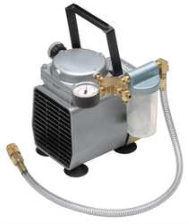 VACUUM PUMP AND GASKET-CORE DRILL RIG